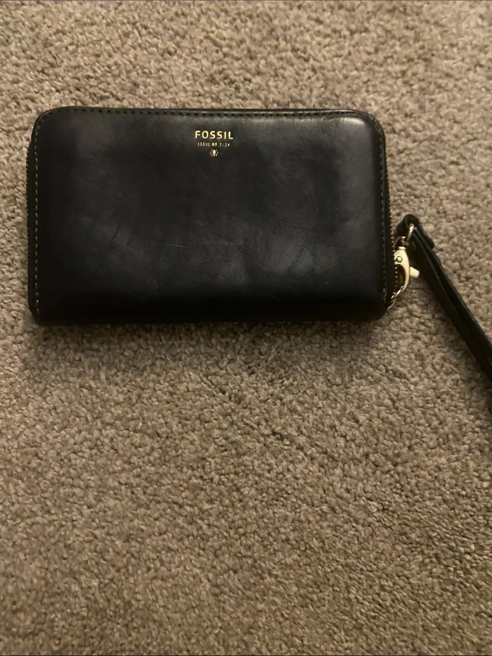 Fossil Black Leather Zip Wristlet with Gold Accent, gently used lots of life.